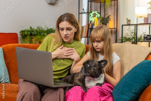 Photography Mother and daughter with French bulldog at home fail contest on laptop lose game sigh feel sad