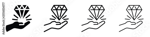 Photos Hand holding a sparkling diamond, representing value and preciousness