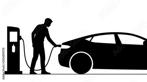 Silhouette of a man charging an electric car at a charging station