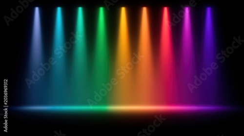 Colorful stage lighting with vibrant beams in a dark setting.