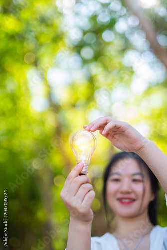 light bulb against nature, icons