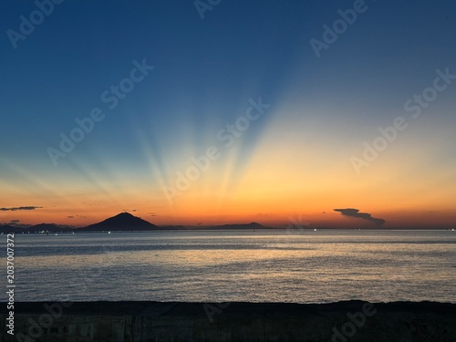 Photography Beautiful sunset ocean with crepuscular rays