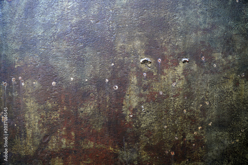 Fotografie Rusty and weathered surface with various textures and spots
