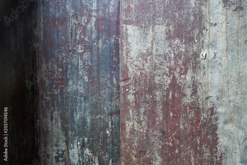 Bild auf Leinwand Weathered and aged metal surface with visible paint deterioration