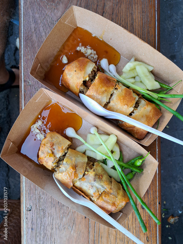 Semarang spring rolls are a type of rollade filled with bamboo shoots, egg, and chicken or shrimp. They are a blend of Chinese and Indonesian flavors.