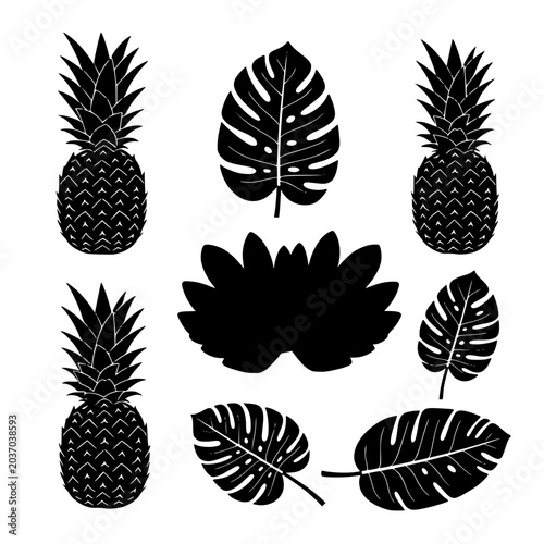 Tropical leaf and pineapple silhouettes set