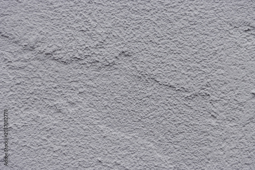 Foto A gray wall with a rough texture