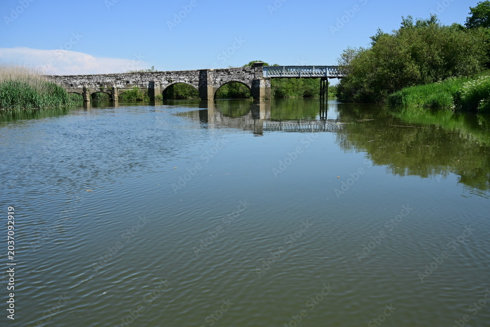 Fototapeta premium Road Bridge Crossing the River Arun.