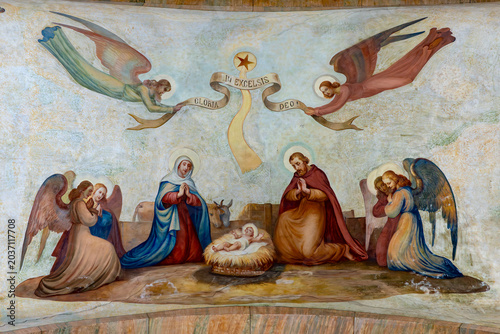 Obraz na płótnie Fresco of Christmas Nativity Scene with Virgin Mary, Saint Joseph, and Jesus baby