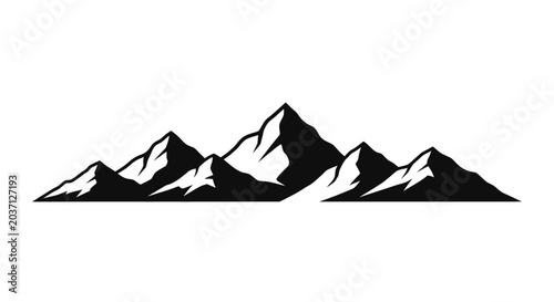 Silhouette of rugged mountain range with snow capped peaks on white background