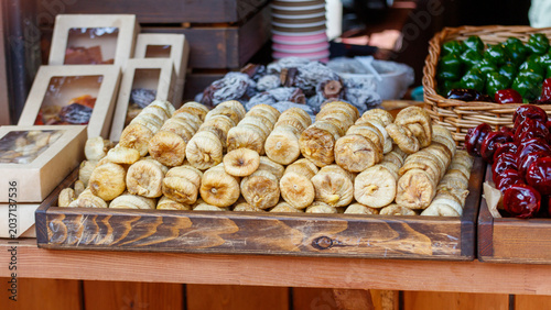 Foto Market display with golden pastries, green chilies