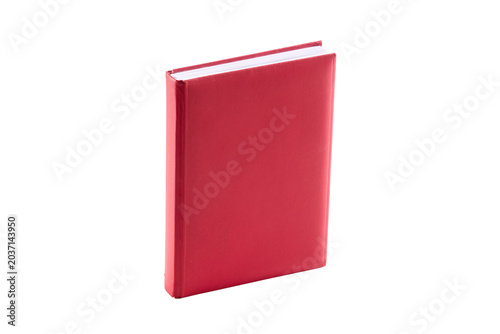 Solid red notebook stands upright