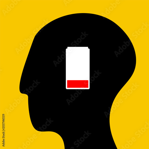 Photos Head silhouette with a low battery icon, symbolizing mental fatigue, stress, exhaustion, and depleted energy