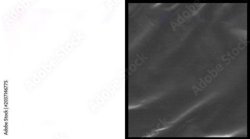 Tableau sur toile Crumpled black plastic texture, wrinkled dark polyethylene film background, glos