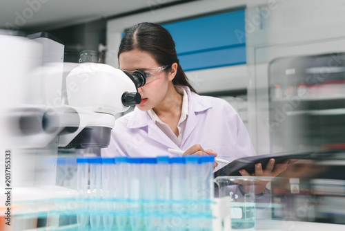 Bild auf Leinwand Medical biotechnology research laboratory scientist analyzing samples modern env