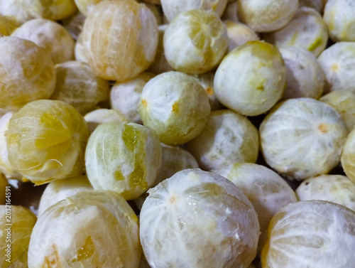 Foto Peeled Small Yellow Citrus Fruits Group Close