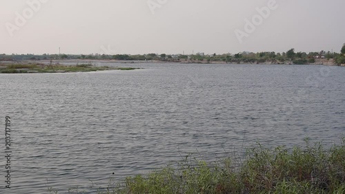 Calm reservoir shoreline and freshwater landscape video