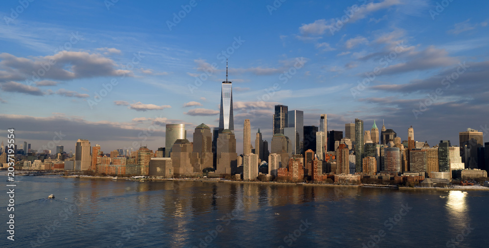 Obraz premium NYC Manhattan cityscape with New York panorama with blue sky. New York downtown cityscape with blue sky panorama. New York City skyline. Manhattan skyline in New York City.