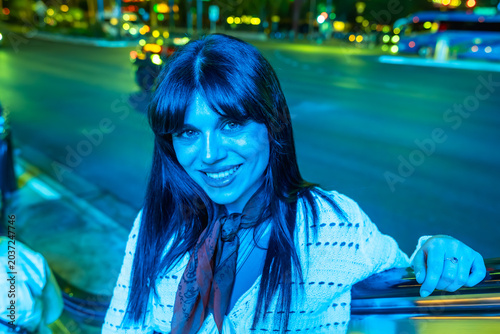 Photography Woman smiling enjoying vibrant las vegas nightlife