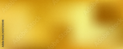 Gold wall texture background. Yellow shiny gold foil paint on wall sheet with gloss light reflection, vibrant golden paper luxury wallpaper