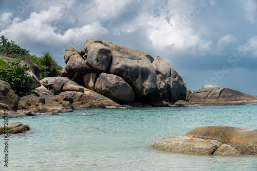 Beautiful tropical island with giant granite rock formations on the beach, crystal clear turquoise water