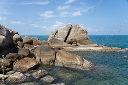 Beautiful tropical island with giant granite rock formations on the beach, crystal clear turquoise water