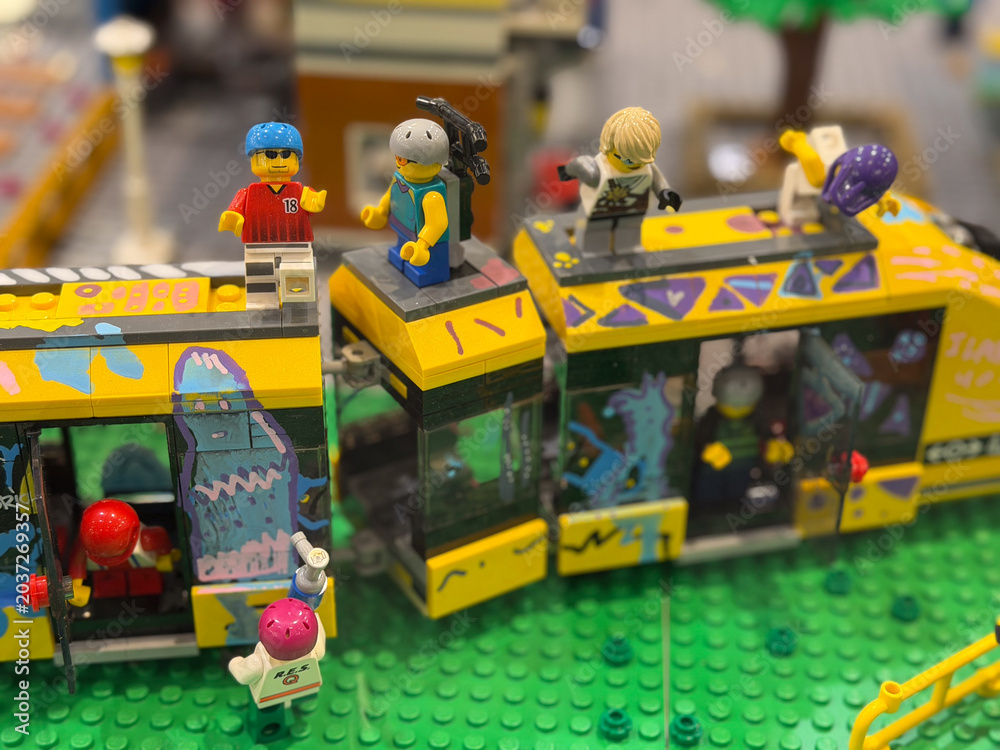 Obraz premium Colorful toy train with minifigures