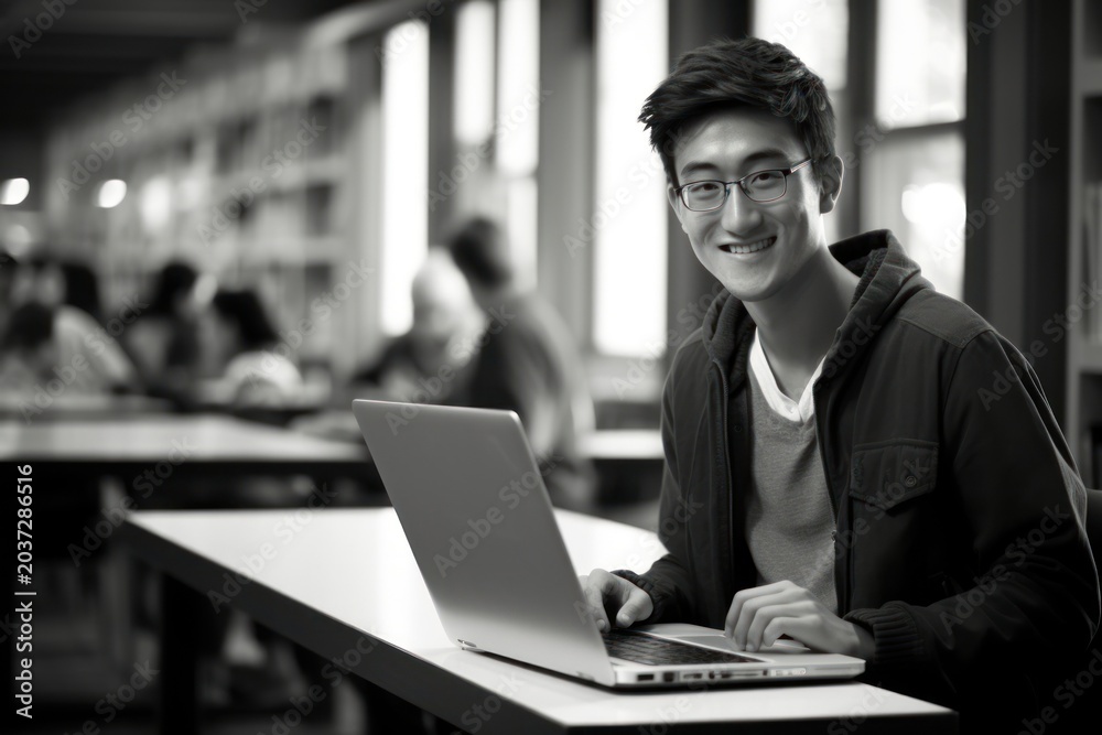 Fototapeta premium Smiling Asian student laptop photography university.