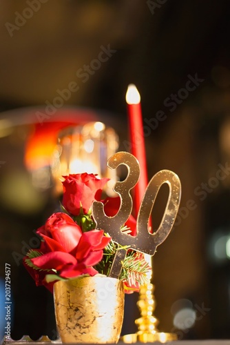 Elegant table centerpiece for a 30th birthday or anniversary celebration