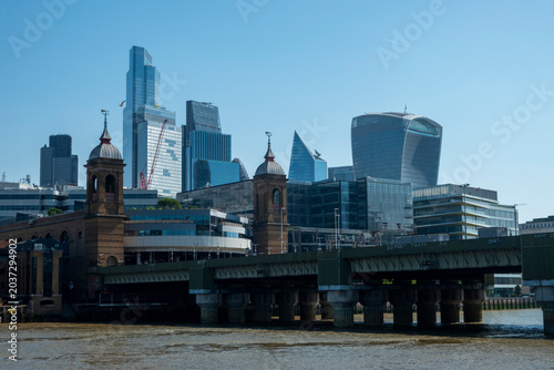 London, UK, 27th May 2026 - The confused skyline of London's financial district with Blackfriars bridge.  Modern and traditional architecture