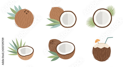 Coconuts with green leaves and halved.