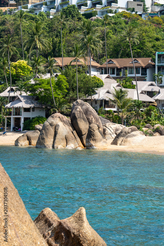 Beautiful tropical island with giant granite rock formations on the beach, crystal clear turquoise water