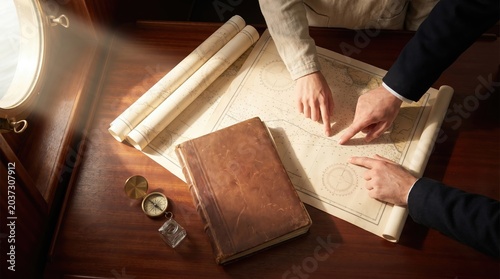 Navigational charting on historical maritime map for heritage ship expedition planning