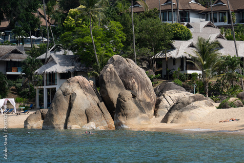 Beautiful tropical island with giant granite rock formations on the beach, crystal clear turquoise water