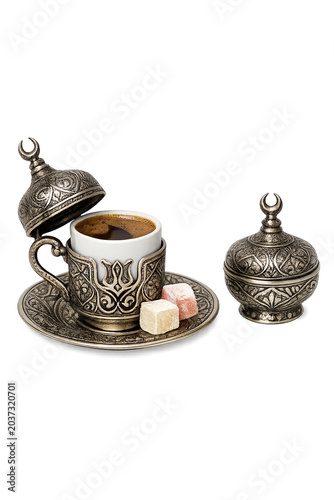 Traditional coffee set with coffeepot and cups, highlighting intricate design.