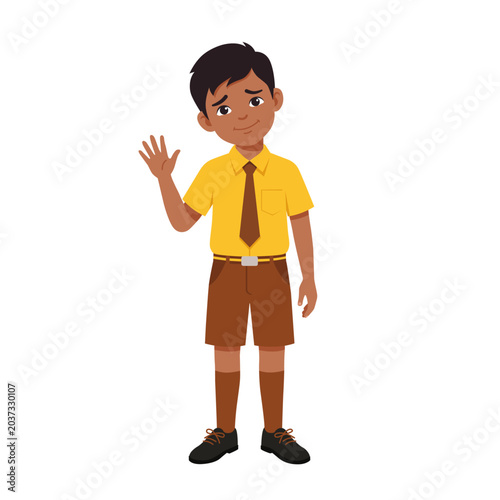 Obraz na płótnie Sad Indian schoolboy in a yellow and brown uniform standing and waving goodbye with a tilted head and a reluctant smile