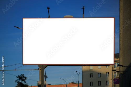 White billboard along the highway. Background for design and advertising.