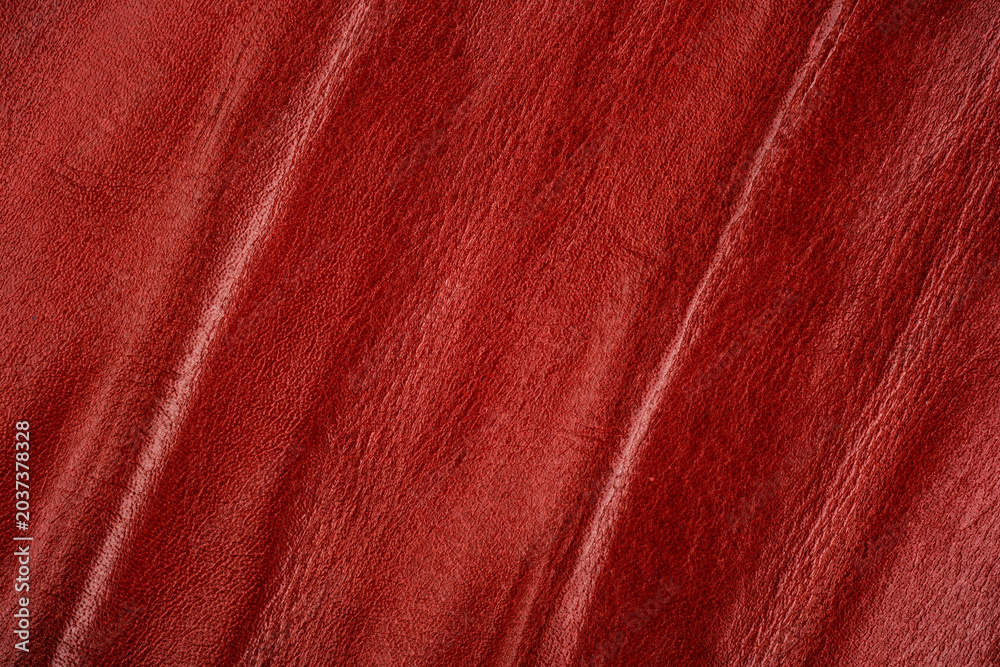 Φωτογραφία Macro shot of red leather texture surface