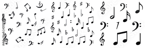 Foto Musical notes and clef symbols isolated on white background, black and white art
