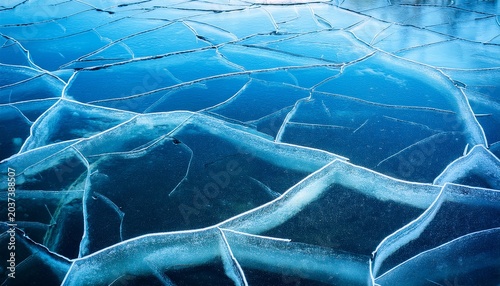 Abstract Ice Background Blue Background With Cracks On The Ice Surface
