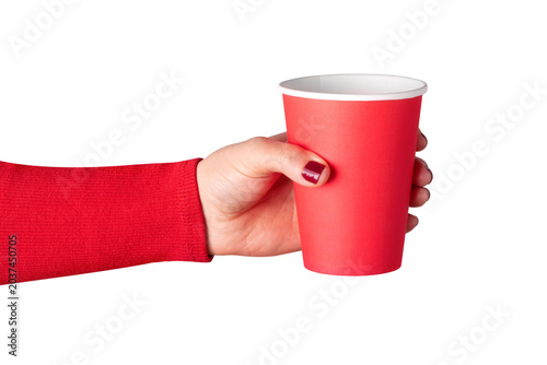 Close-up of a female hand holding a red paper cup on transparent background. Simple composition ideal for beverage, branding, or event concepts.