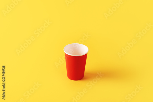 Red Paper Cup on Yellow