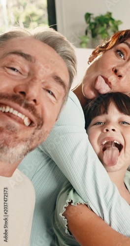 Selfie, silly face and family in home for social media post, memory and bonding. Love, photography pov and profile picture with parents and girl in house for connection, humor and funny or tongue out