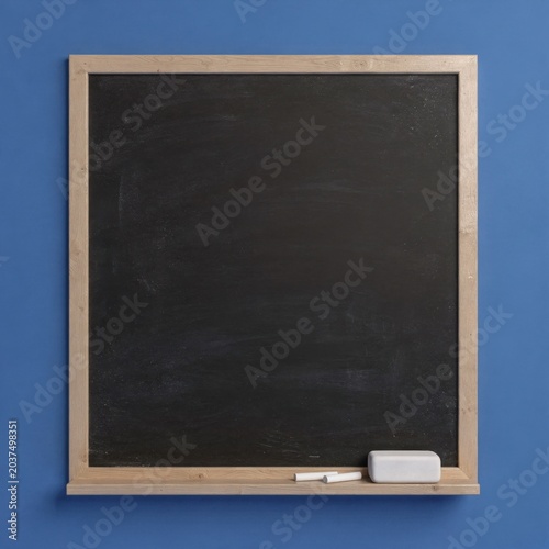 black chalkboard with wooden frame and chalk