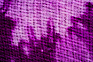 Close up of purple tie dye fabric texture
