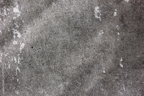Authentic concrete wall with scratches. Old concrete foundation. Reinforced concrete background, texture.