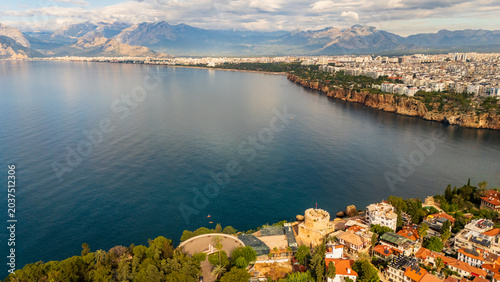 Photos drone aerial of Antalya marina harbor bay and the steep coastal cliffs
