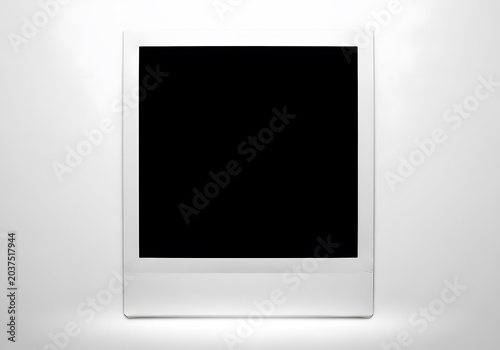 A blank polaroid photo on a white background with a shadow