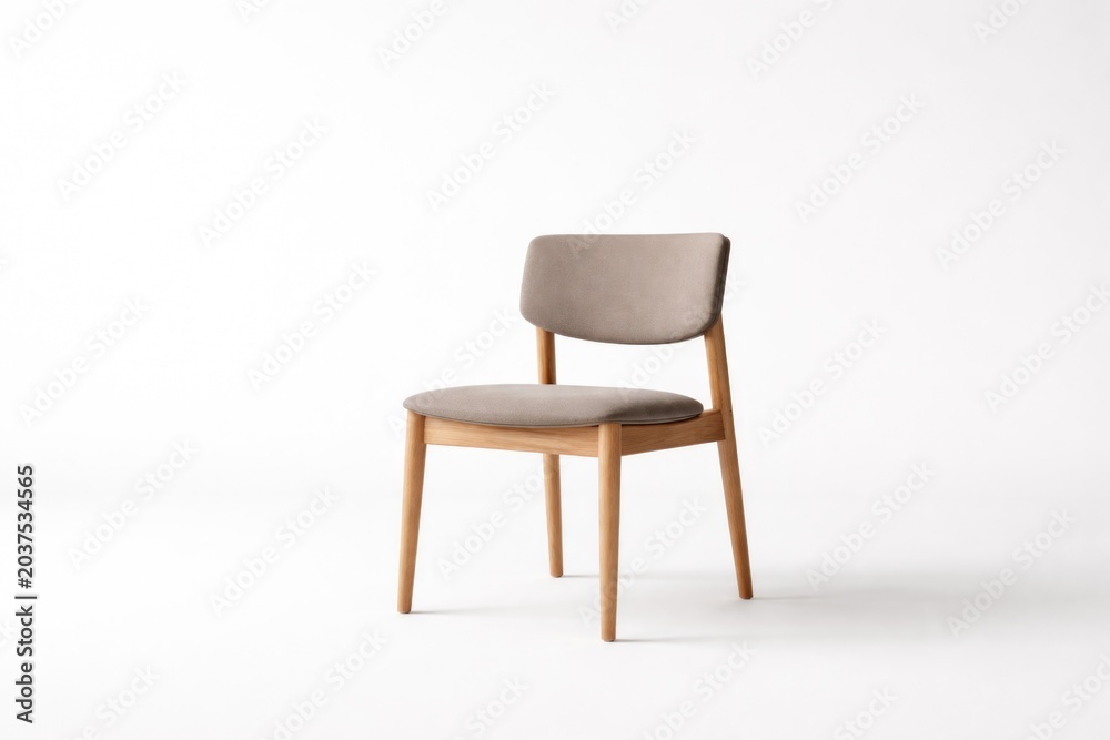 Obraz premium Minimalist wooden seat with taupe upholstery set against white backdrop providing copy space