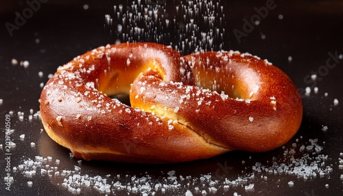 soft pretzel baked with golden brown color and sprinkled with coarse salt